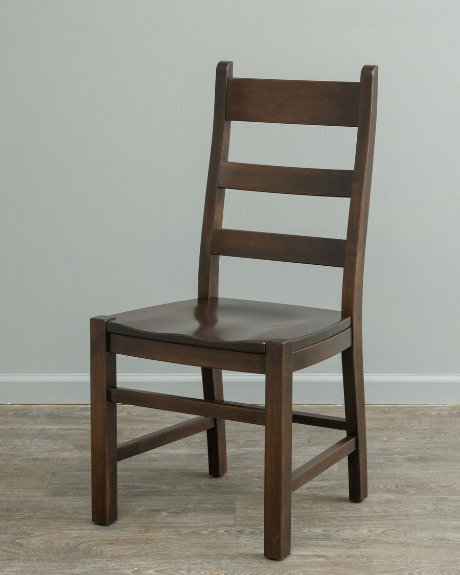 Dark brown ladder back dining chair with three horizontal slats, a scooped seat and side stretchers