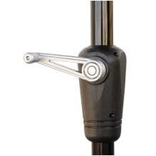 Silver crank handle and black housing on the pole of a 9 foot patio umbrella