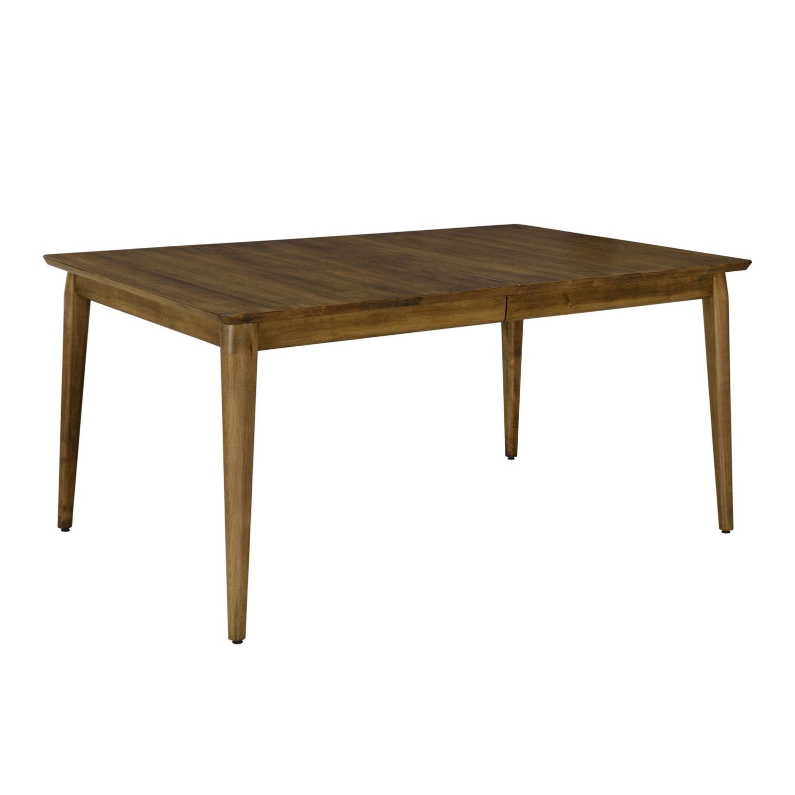 Mid century walnut dining table with six curved spindle chairs under black pendant lights by a brick wall