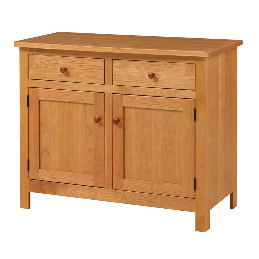 Natural cherry two-door dining buffet with two drawers, round wood knobs, flat panel doors and square legs