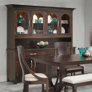 Espresso four-door china hutch filled with teal glassware above an open server, with matching dining chairs