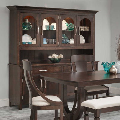 Espresso four-door china hutch filled with teal glassware above an open server, with matching dining chairs