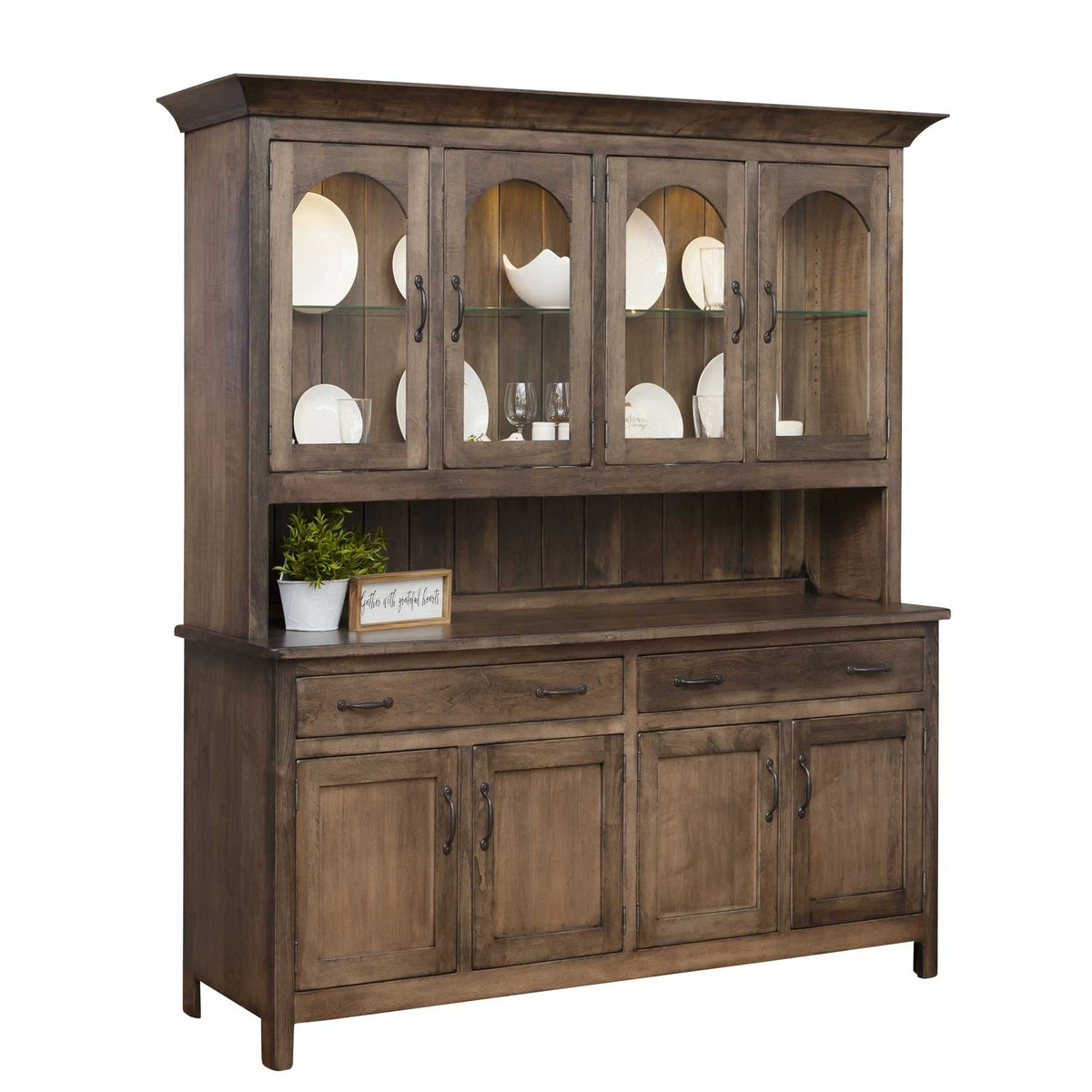 Weathered gray brown four-door china cabinet with lighted arched glass doors, plates and iron pulls
