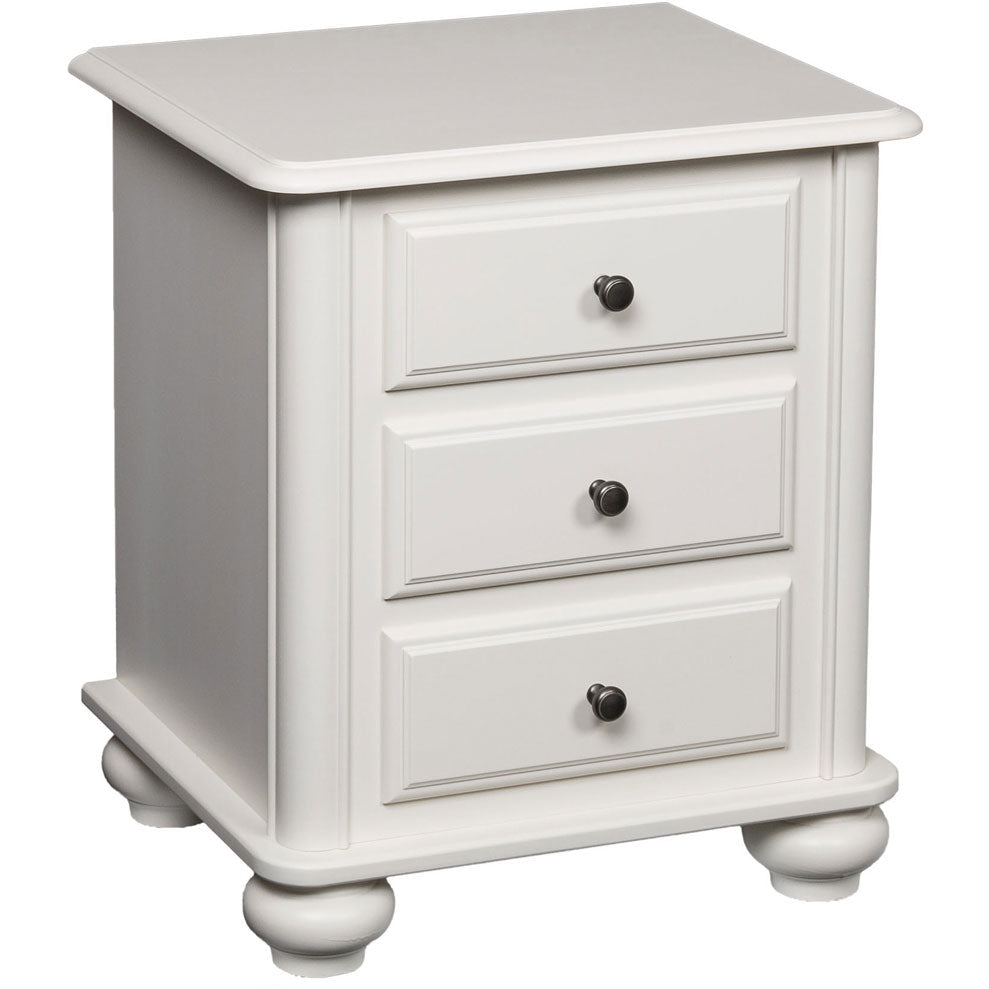 Three drawer nightstand painted white with molded drawer fronts, bronze knobs and rounded bun feet