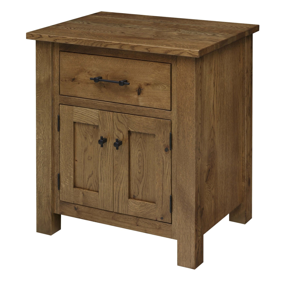 Rustic oak nightstand with one drawer above two recessed panel doors, black bar pulls and thick square post legs