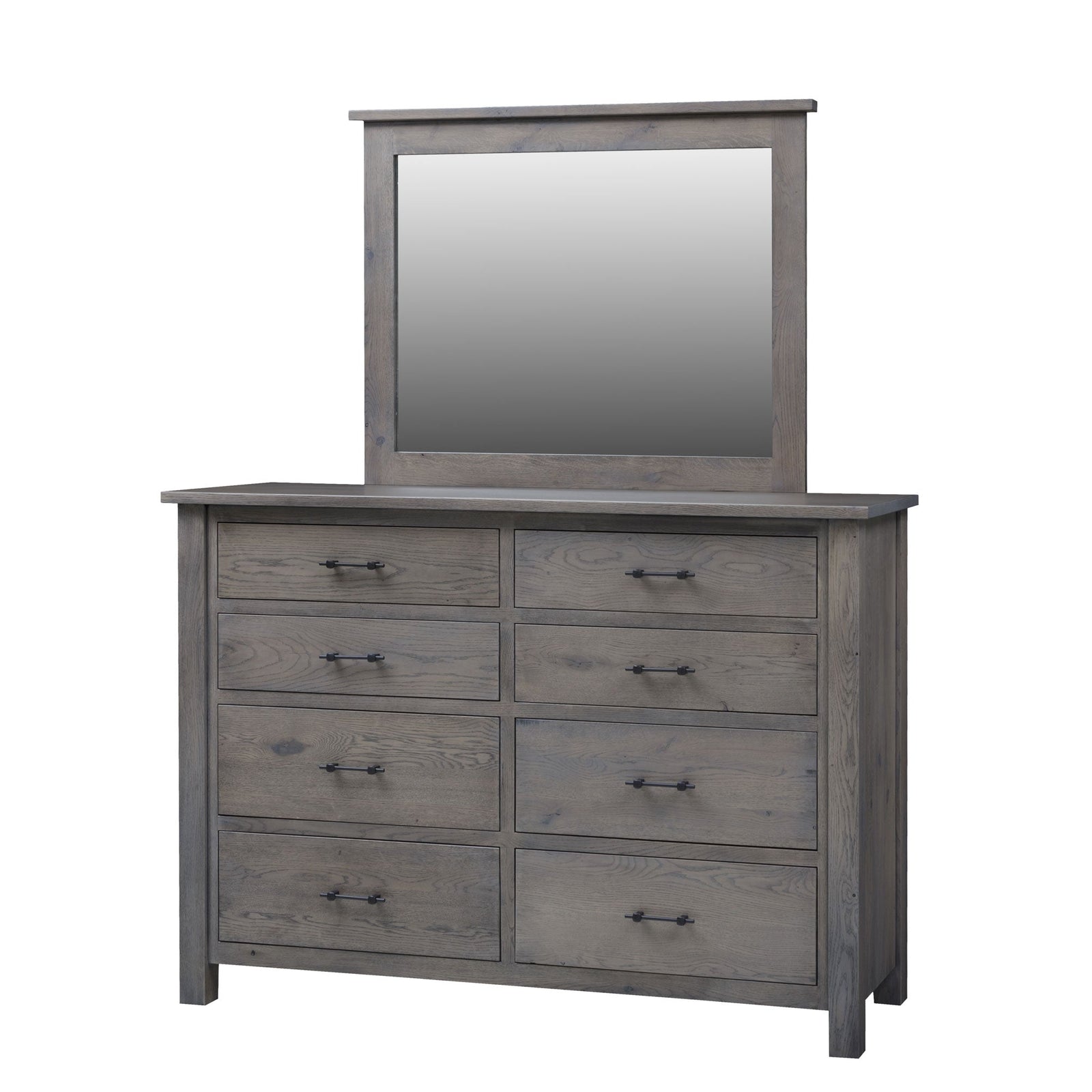 Weathered gray oak eight-drawer dresser with matching wood-framed mirror styled against a rustic stone wall