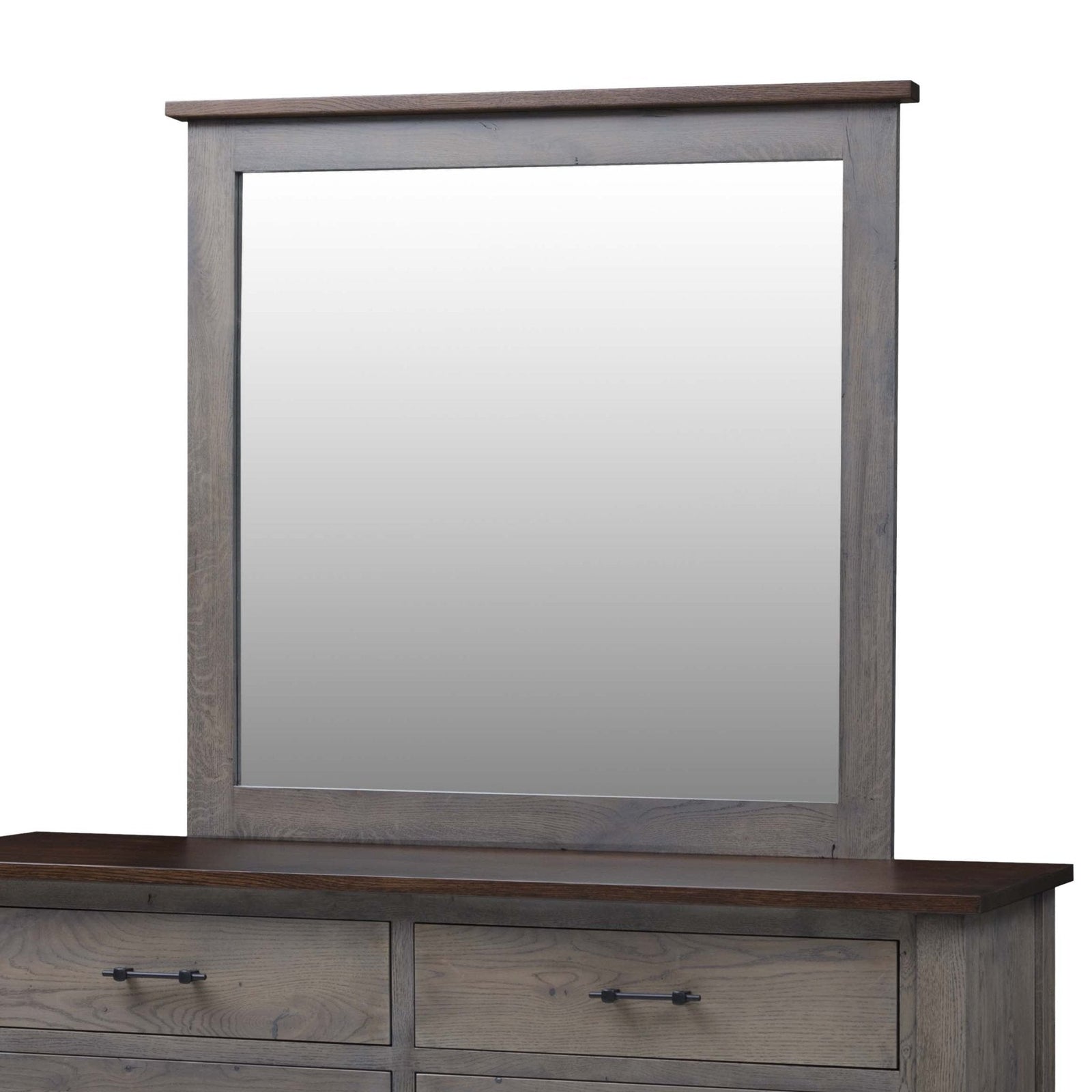 Rectangular bedroom mirror in a gray oak frame with a dark brown top cap, resting on the matching six drawer dresser