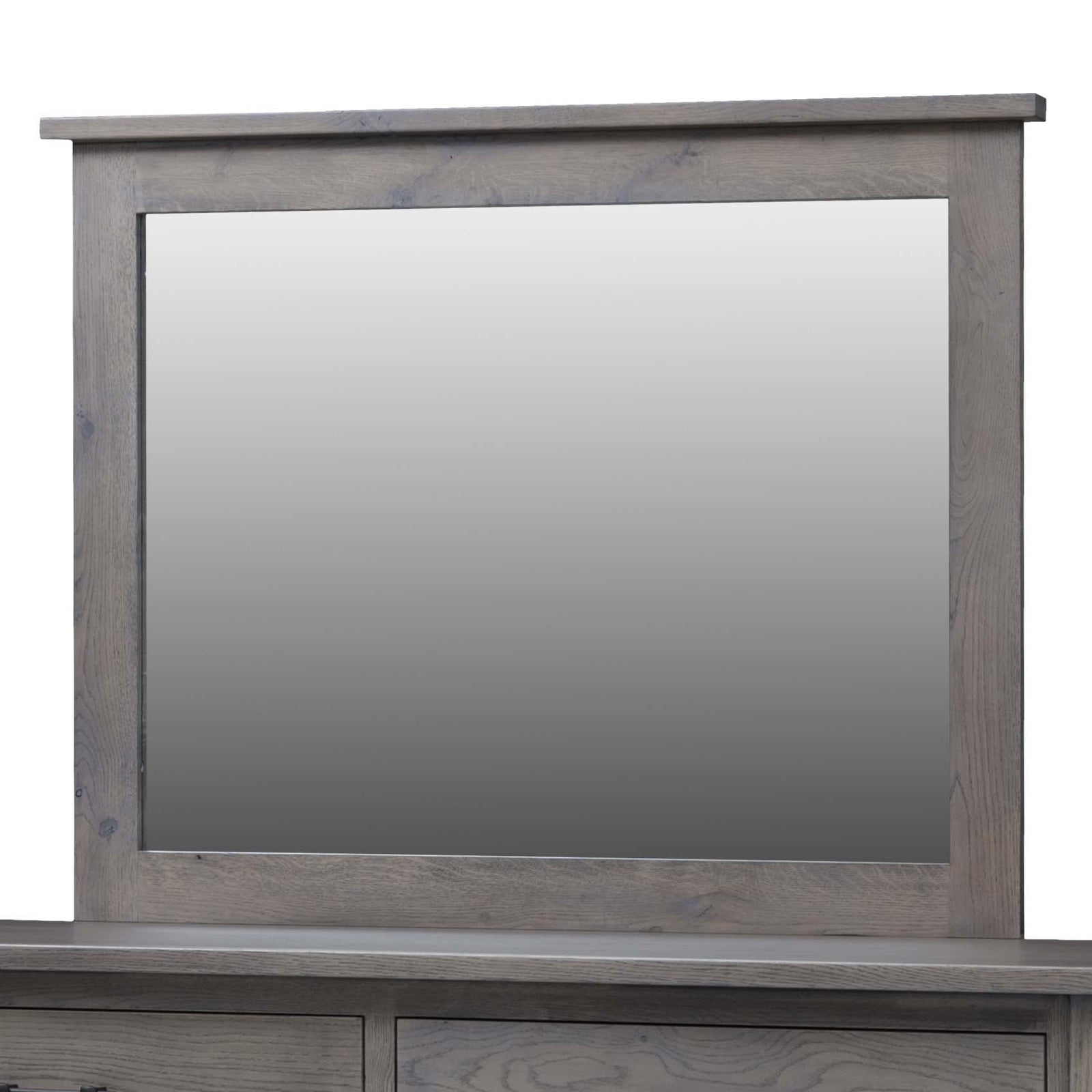 Wide bedroom mirror in a gray weathered oak frame with a shelf-style top cap, mounted above a matching dresser