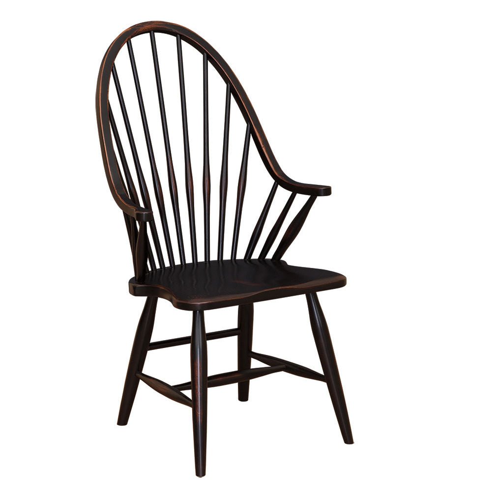 Black Windsor arm chair with tall bent spindle back, continuous arms and splayed turned legs with stretchers