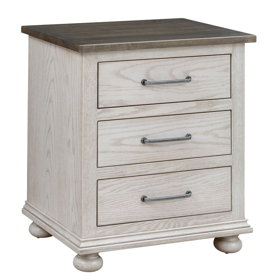Antique white three drawer nightstand with weathered gray top, pewter pulls and turned bun feet on white