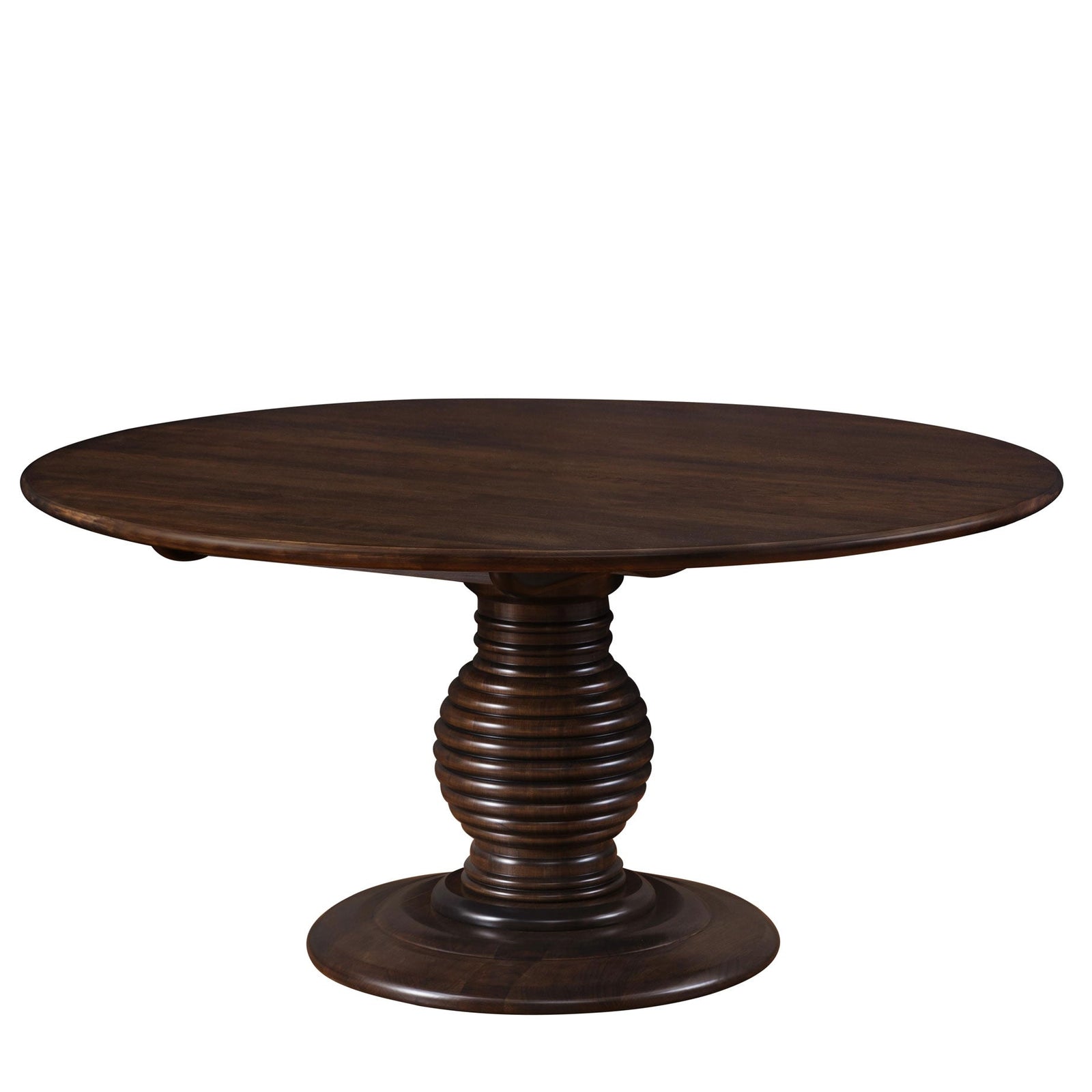 Round pedestal dining table in dark walnut with a beehive turned base, six curved back chairs and a dried floral vase