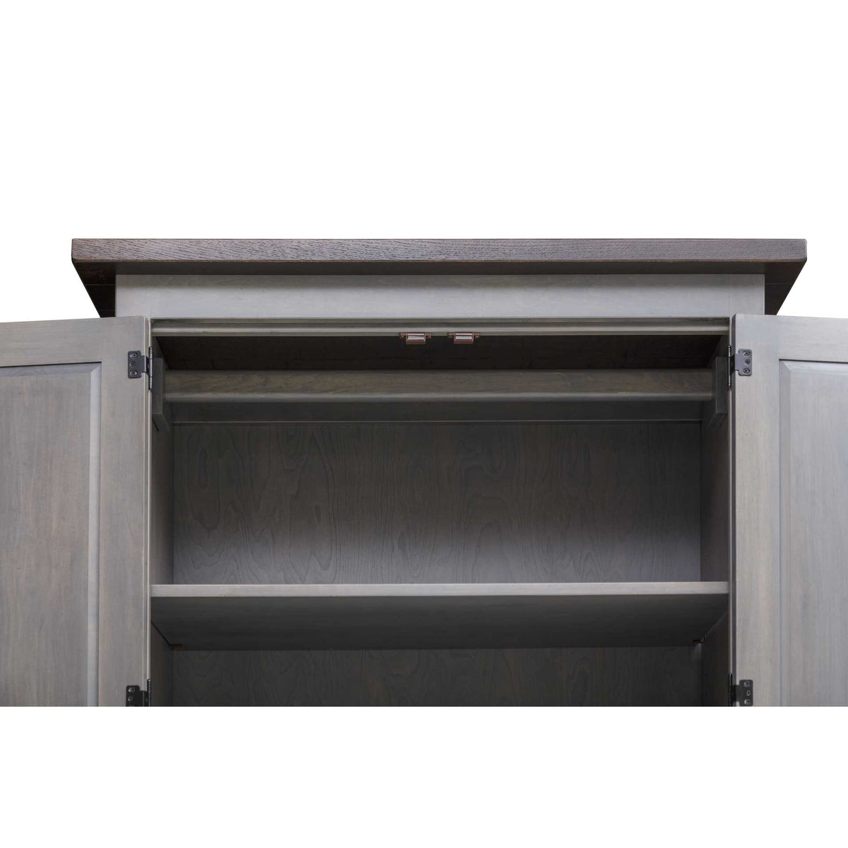 Interior view of the open armoire cabinet showing the clothes rod and upper shelf in gray stained wood