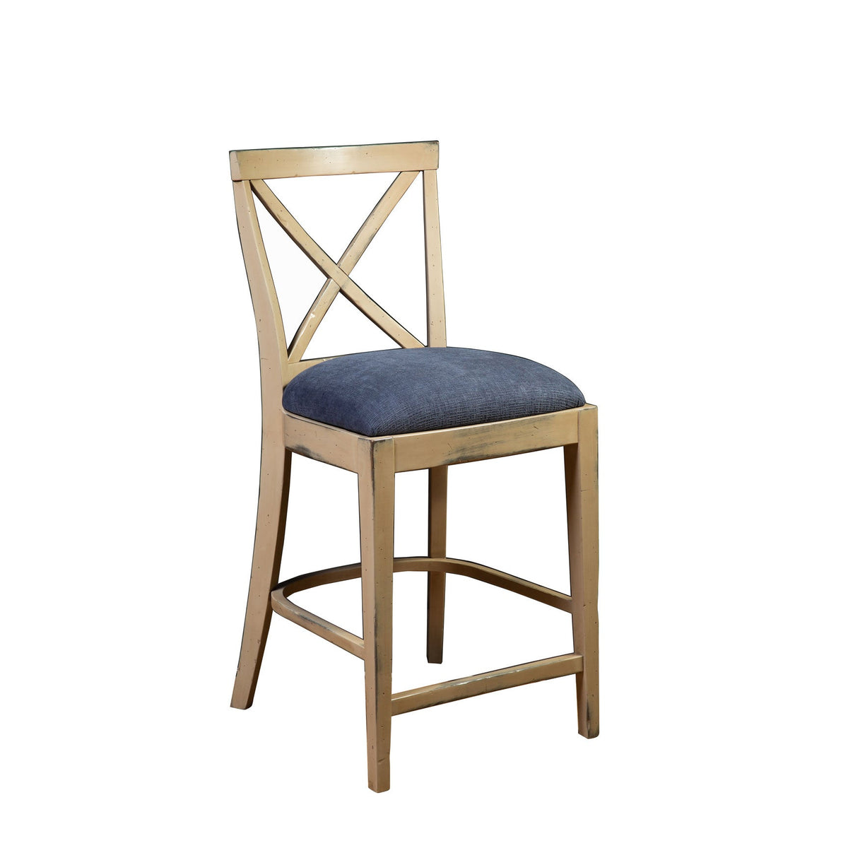 Distressed cream painted X back counter stool with a denim blue upholstered seat and curved foot rail