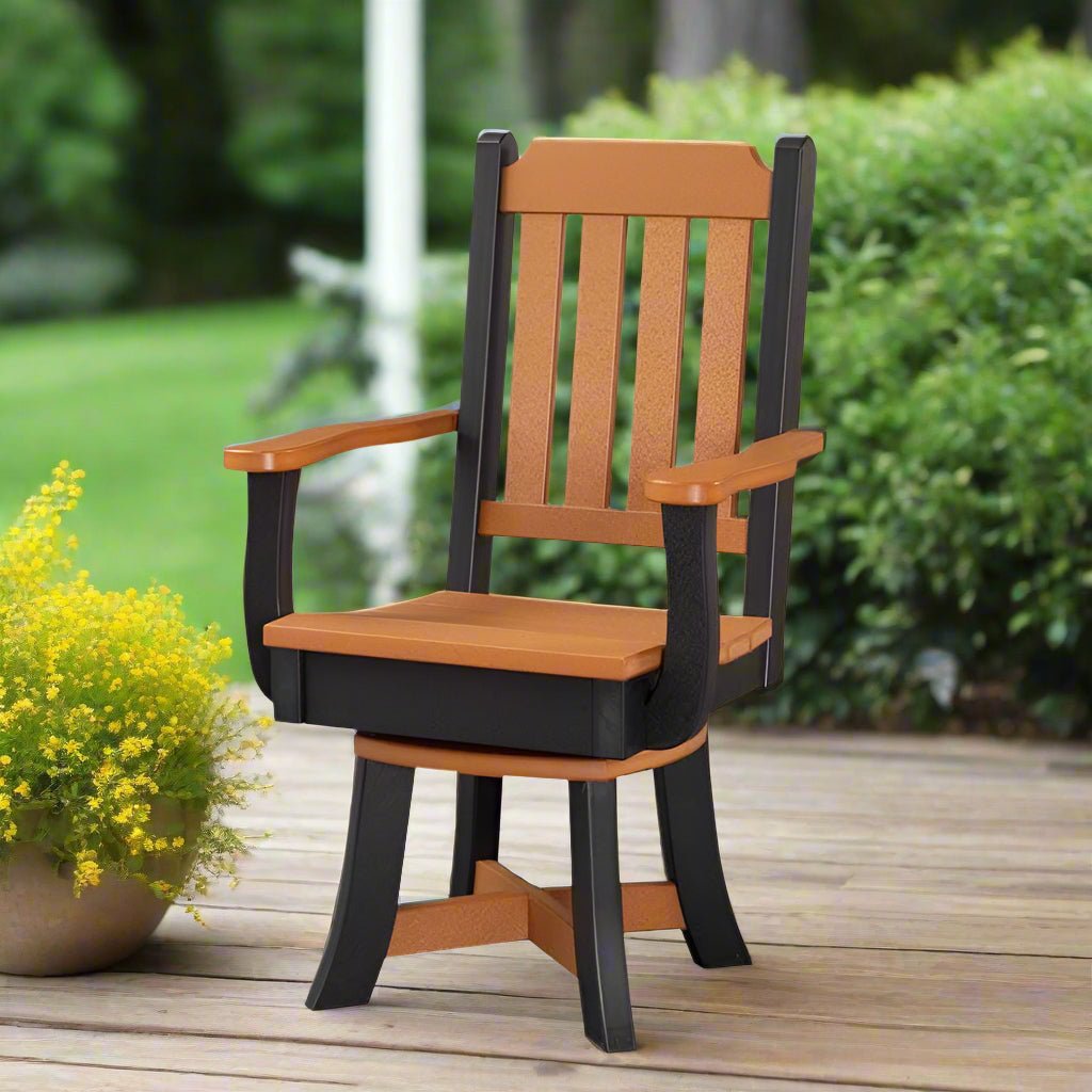 Black and cedar poly swivel dining chair with slat back and curved arms on a garden deck