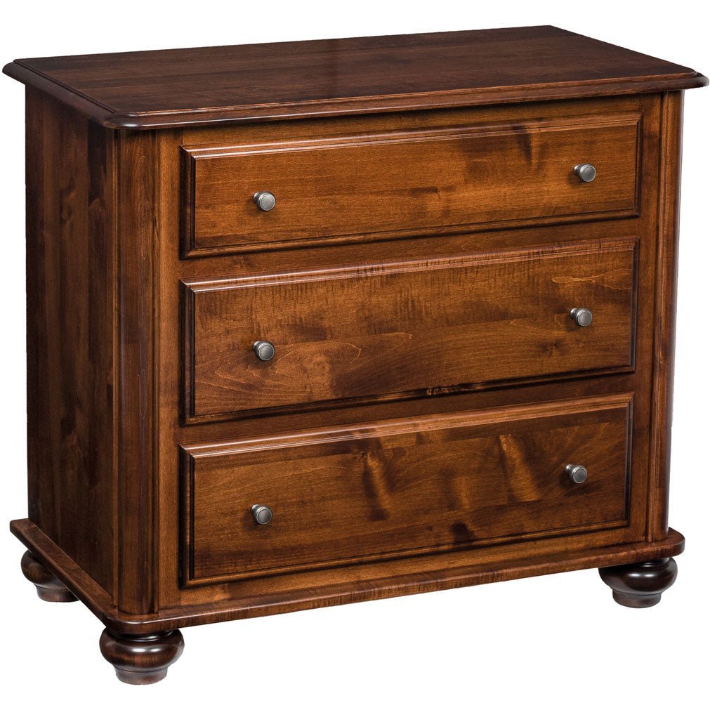 Three drawer changer chest in warm cherry brown maple with nickel knobs and turned bun feet