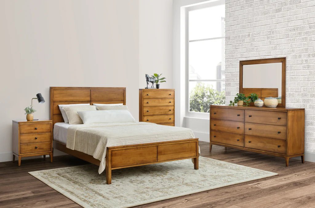 Maple mid century bedroom suite with panel bed, nightstand, chest and six-drawer dresser topped by a mirror