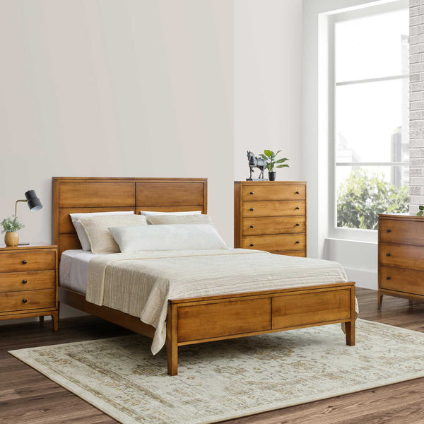 Maple mid century modern bedroom set with panel bed, three-drawer nightstand, five-drawer chest and dresser on a rug
