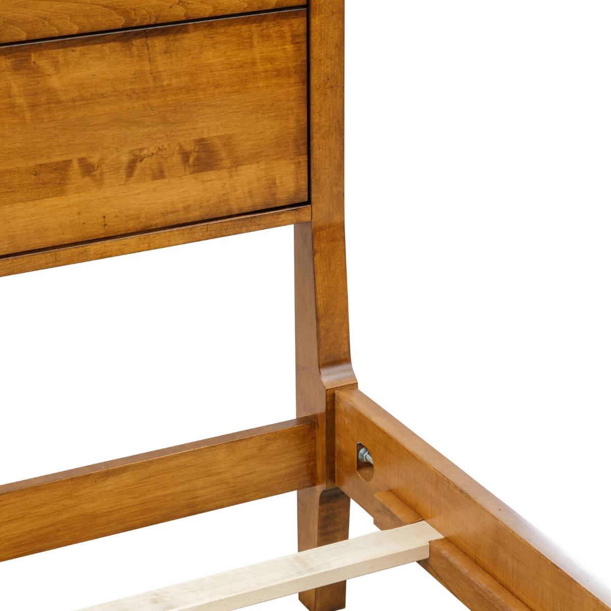 Bolt-together rail joint on the maple bed showing the recessed hex bolt and a maple support slat