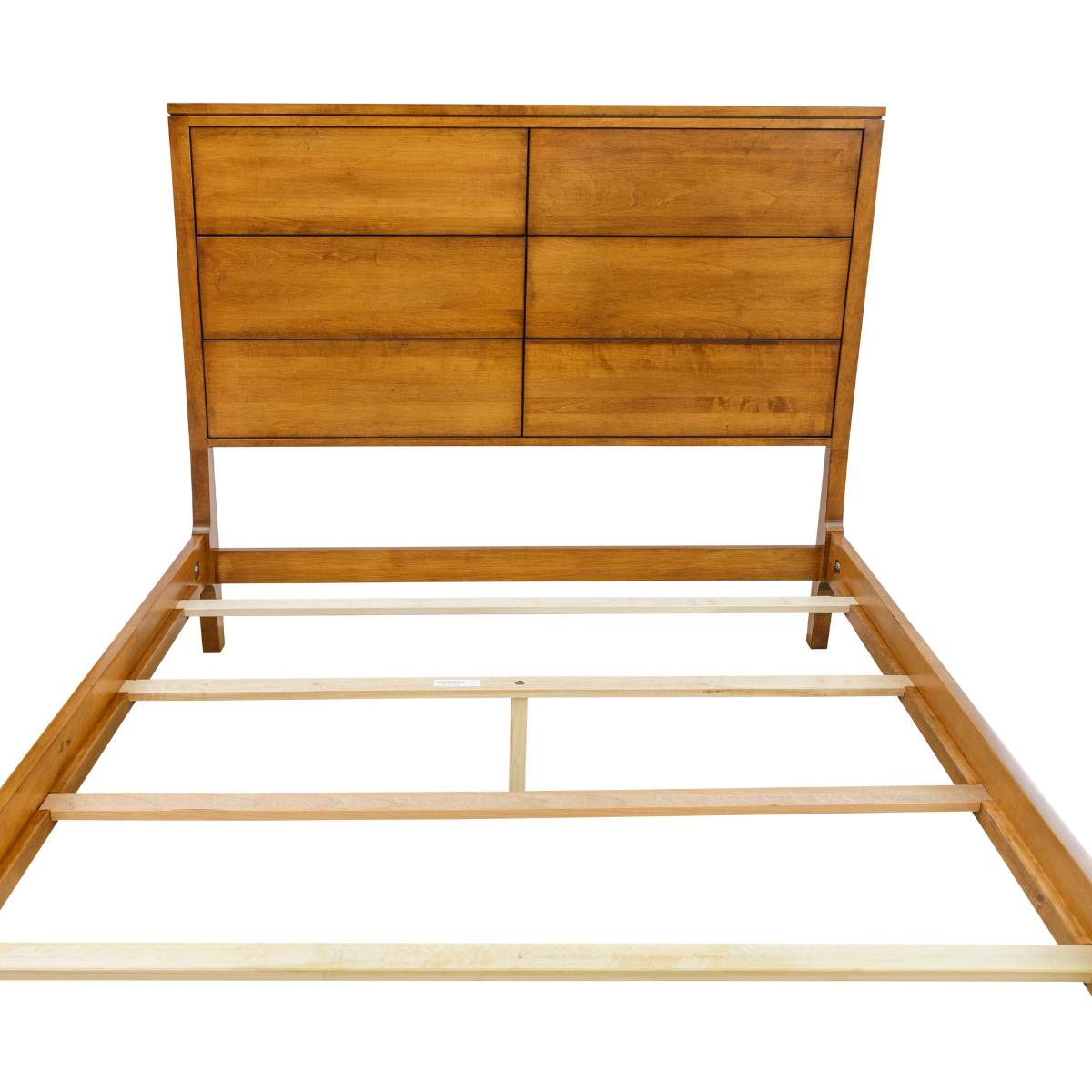 Maple panel bed frame from the head with grid headboard, side rails and light maple support slats installed