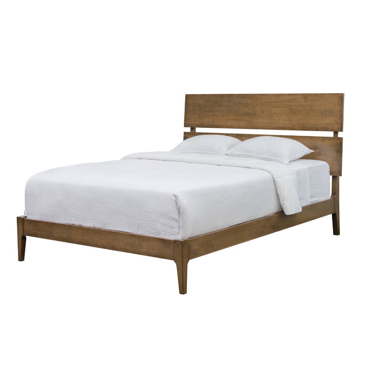 Mid century sleigh bed in light driftwood-toned wood with an angled two-panel headboard and white bedding