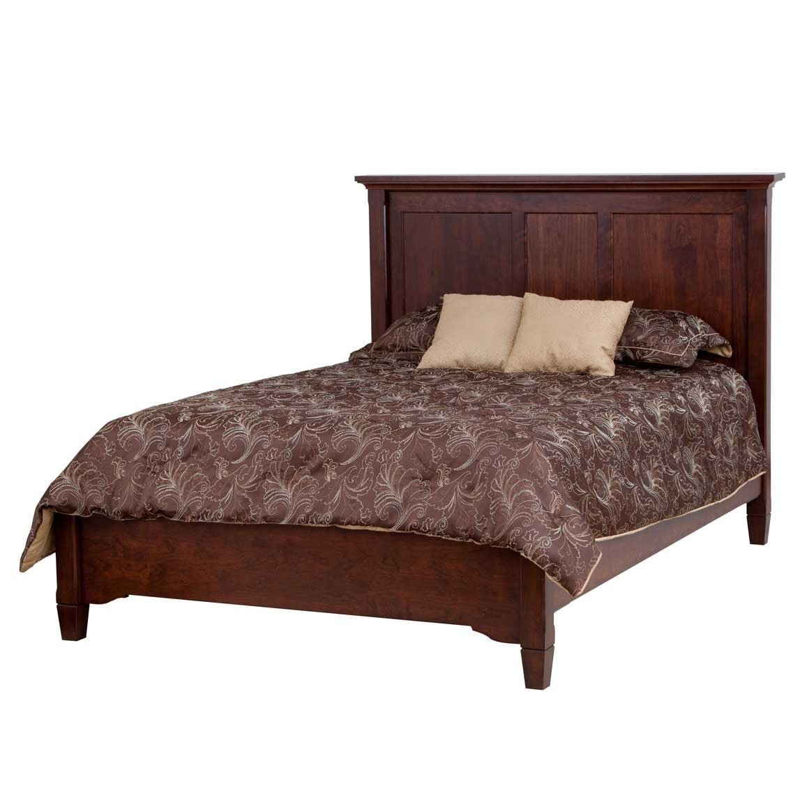 Espresso-toned panel bed with a tall three-panel headboard, low footboard and brown swirl-print bedding