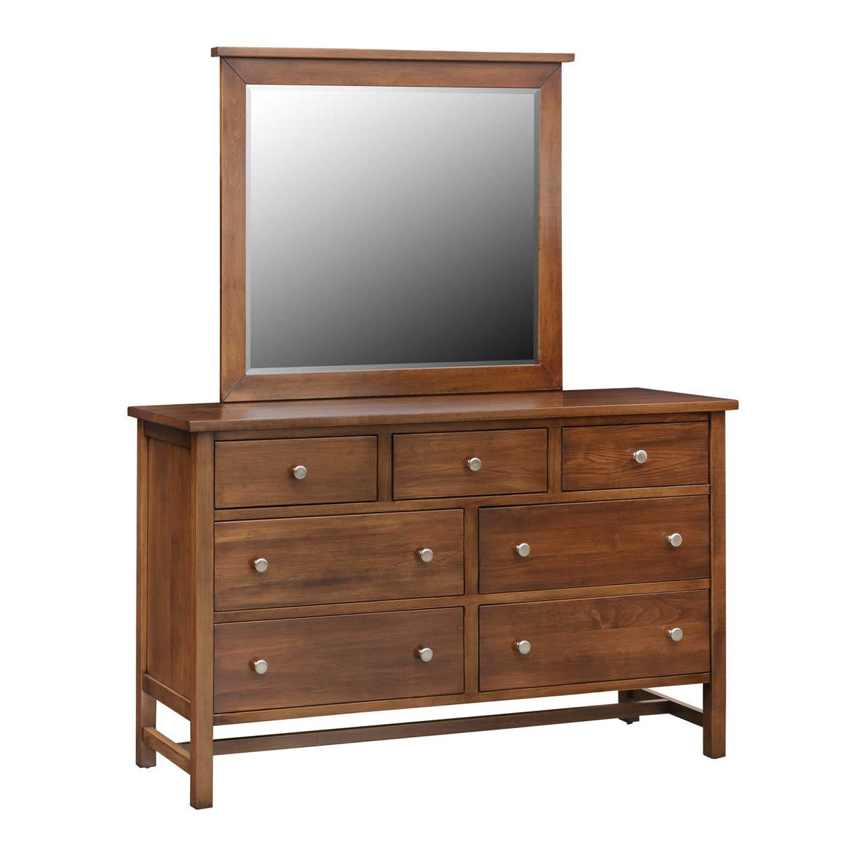 Tall square mirror in a medium brown wood frame set on the matching seven-drawer dresser with nickel knobs