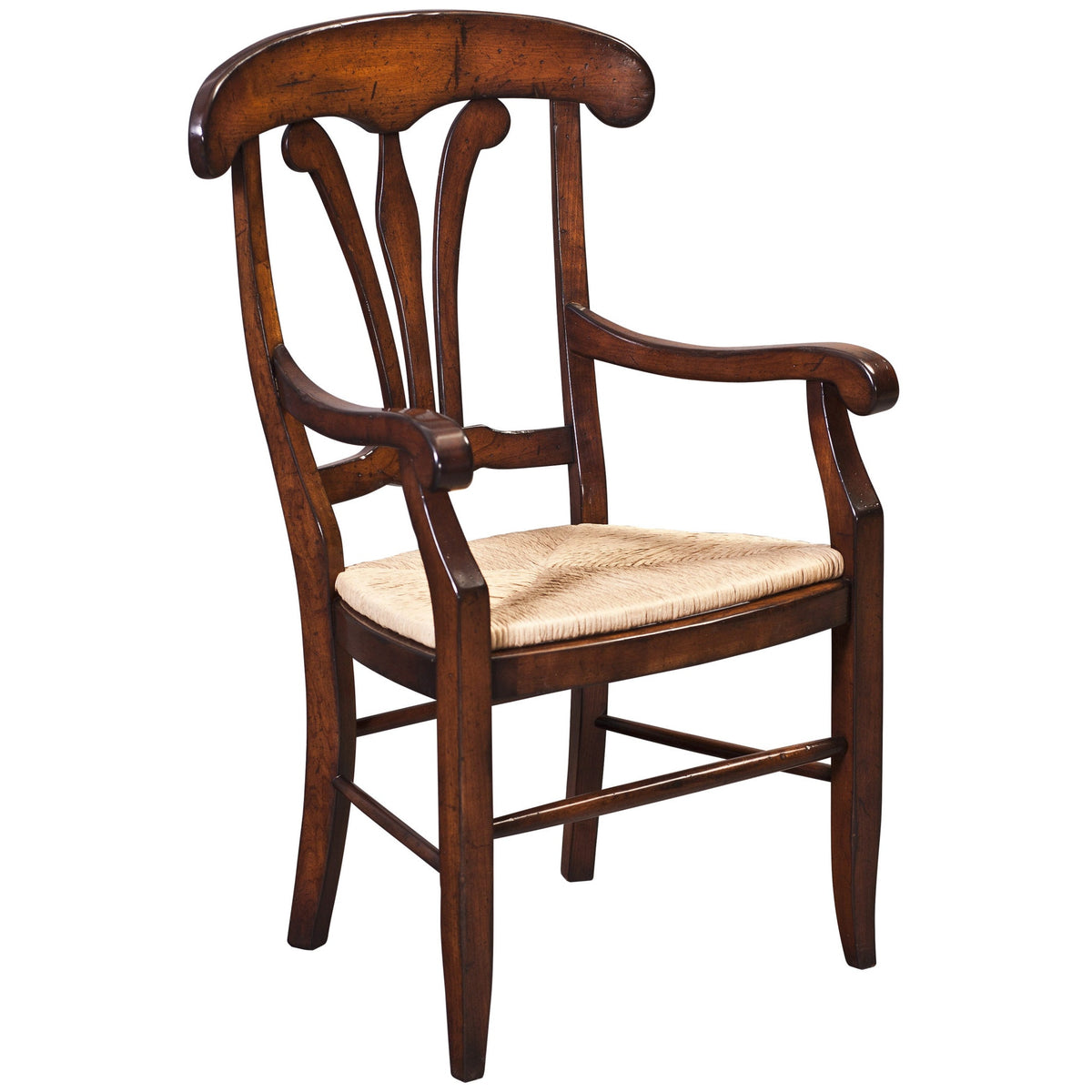 Cherry dining arm chair with scrolled arms, shaped splat back and a woven natural rush seat on white