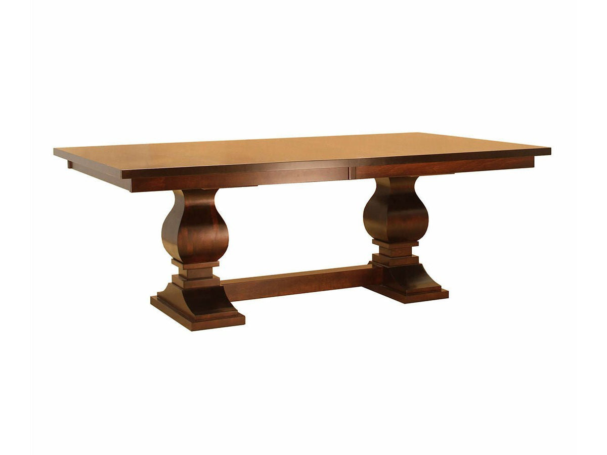 Solid top double pedestal dining table in medium cherry with urn shaped pedestals and a connecting trestle base