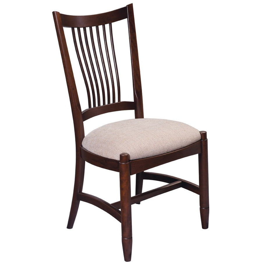 Cherry dining side chair with a fanned lumbar slat back, oatmeal upholstered seat and turned tapered legs