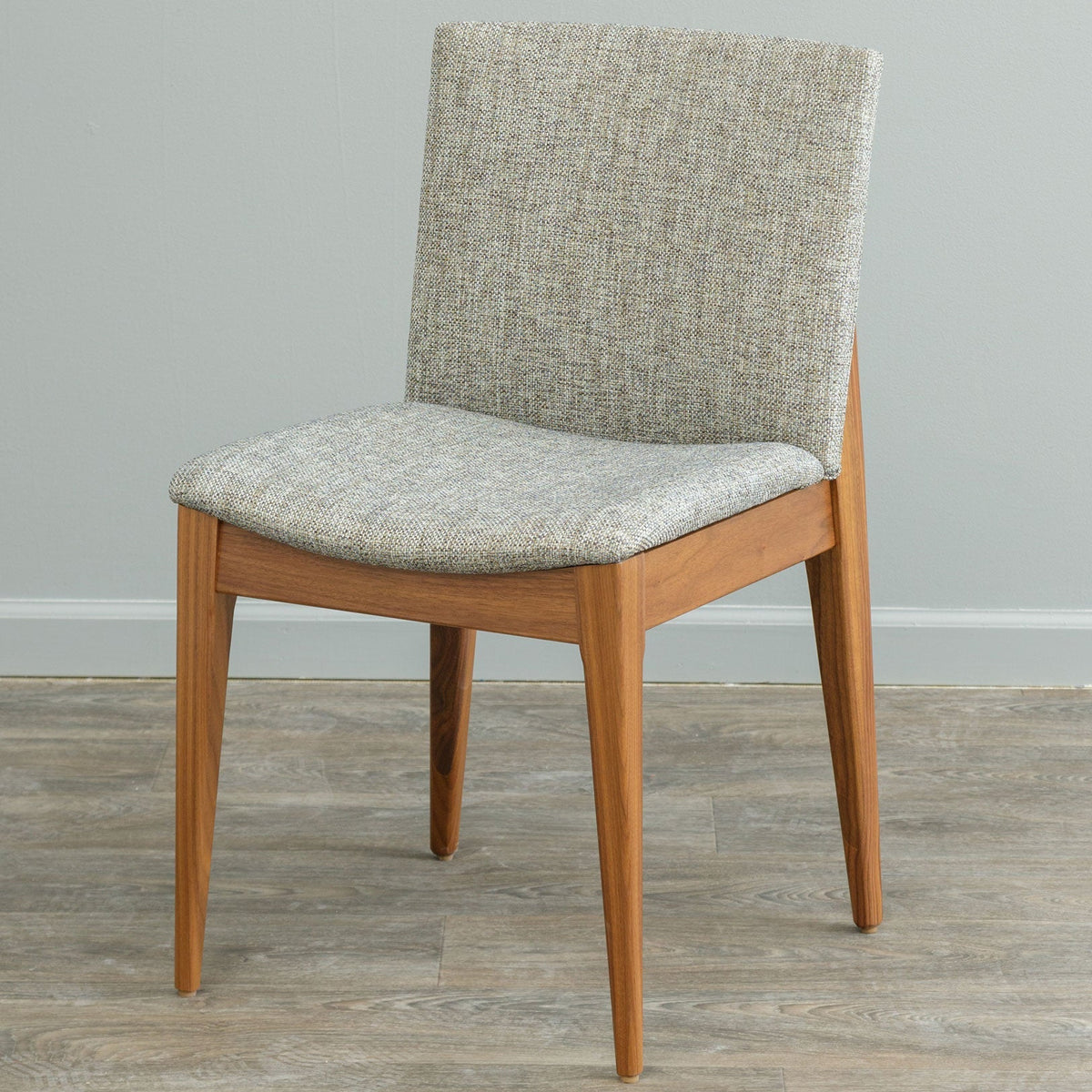 Mid century dining chair with oatmeal woven fabric on seat and back with a warm cherry wood frame