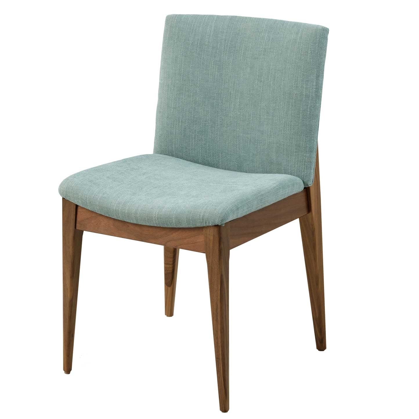 Walnut mid century dining chairs upholstered in sea-green fabric around a round walnut table