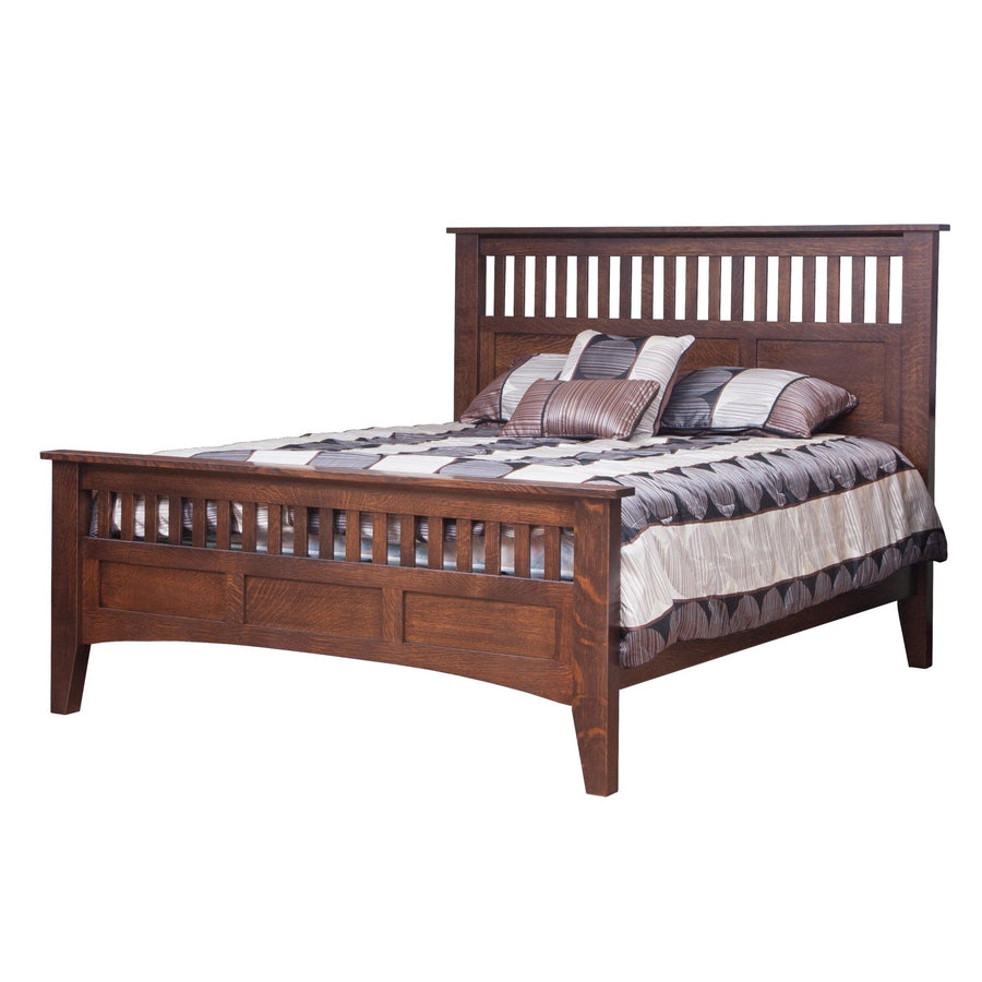Mission style slat bed in dark oak with vertical headboard and footboard slats and striped bedding
