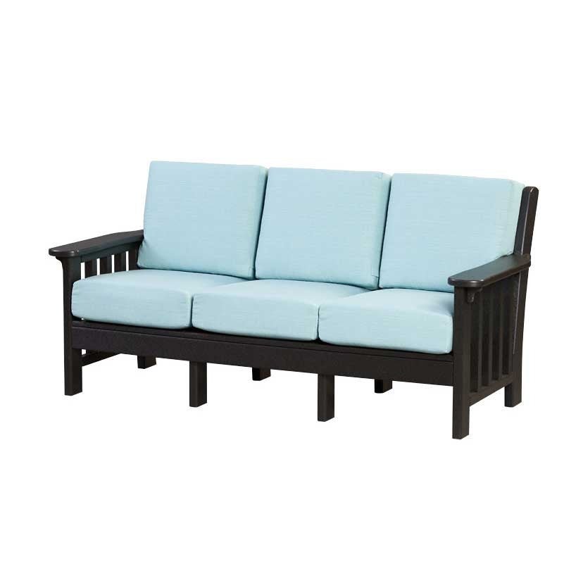 Ivory poly Mission sofa for three with taupe cushions behind a matching slatted coffee table on a rug