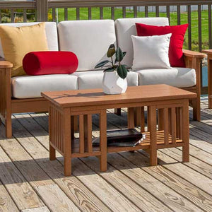 Cedar poly Mission coffee table with slatted sides and lower shelf in front of a white cushioned sofa