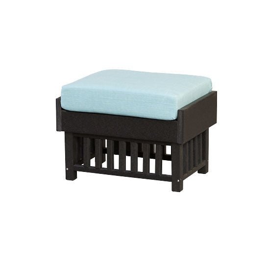 Cream poly Mission ottoman with a patterned cushion and slat sides holding a candle tray on a rug