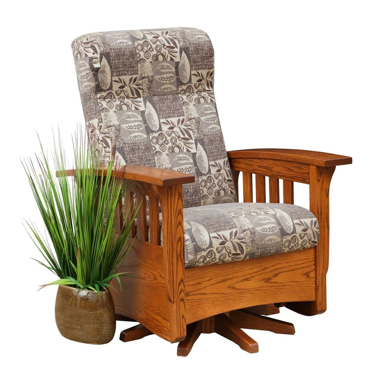 Oak Mission swivel glider with gray and brown leaf print cushions, slat side panels and a four arm swivel base
