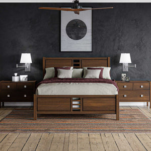 Bedroom with a walnut panel bed with slotted headboard detail, two nightstands and wall lamps on a black wall