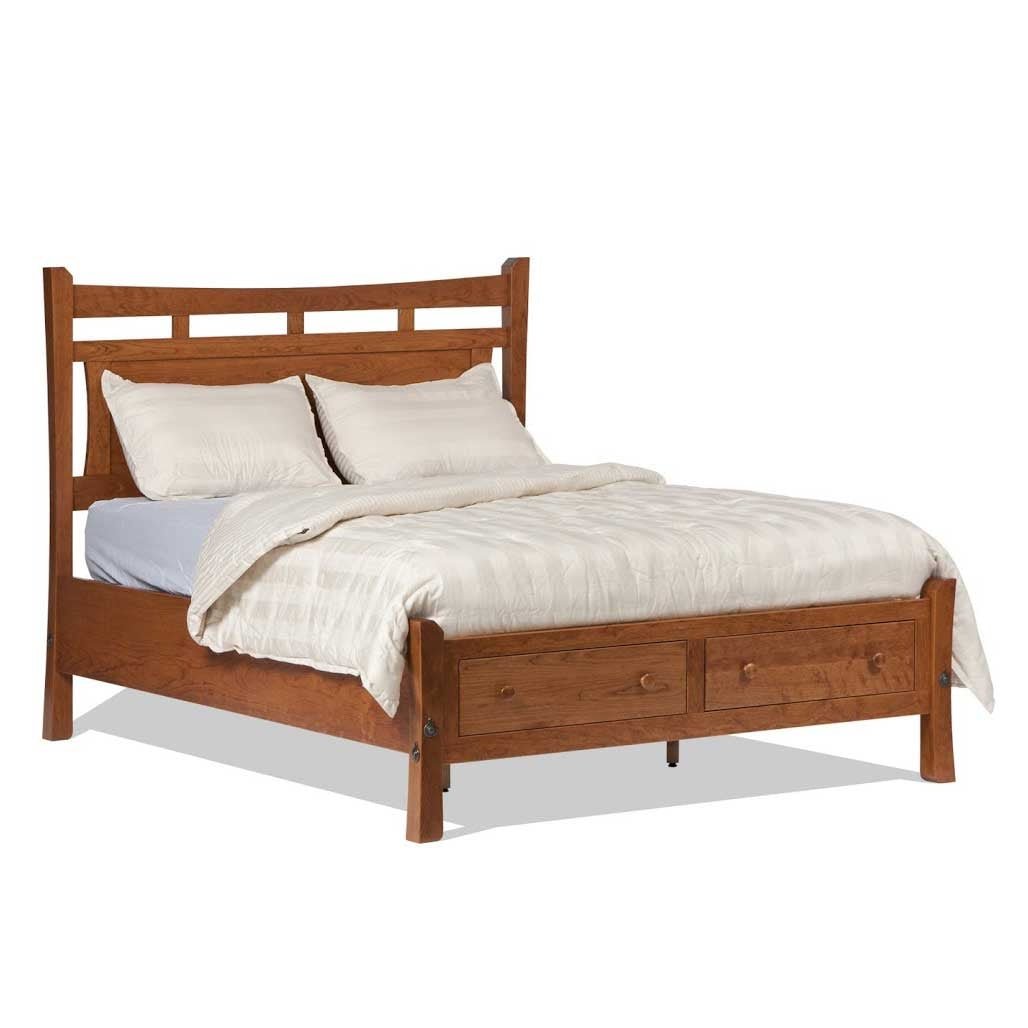 Cherry panel bed with two footboard storage drawers, curved slat headboard and cream bedding, white background
