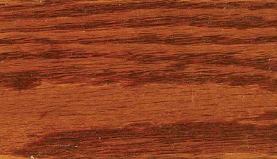 Harvest stain on oak sample, a warm russet brown plank with strong dark grain striping