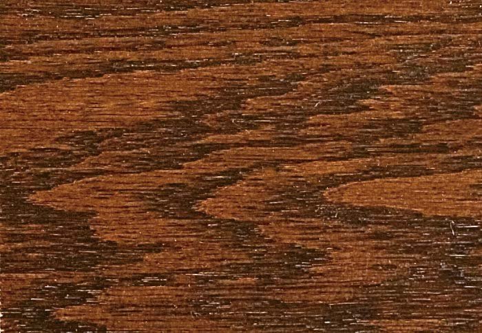 Michaels stain on oak wood sample showing a deep chestnut brown with heavy dark cathedral grain