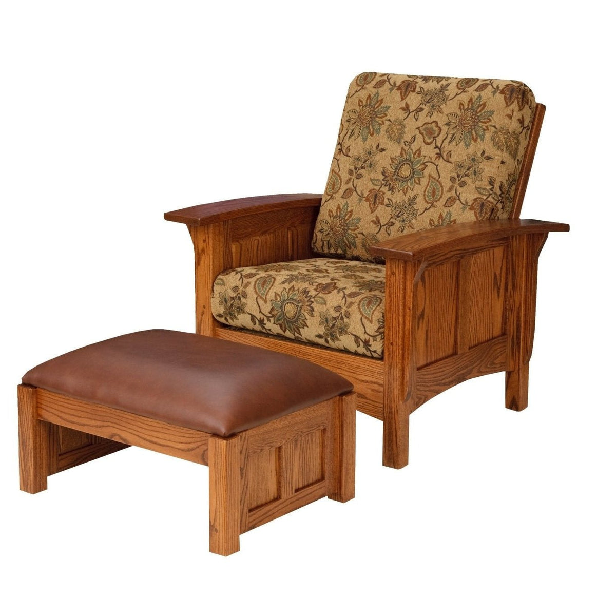 Oak paneled Morris chair with floral tapestry cushions and a matching brown leather ottoman