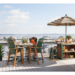Green and cedar bar height chairs and stools around a poly bar and pub table at a boat marina