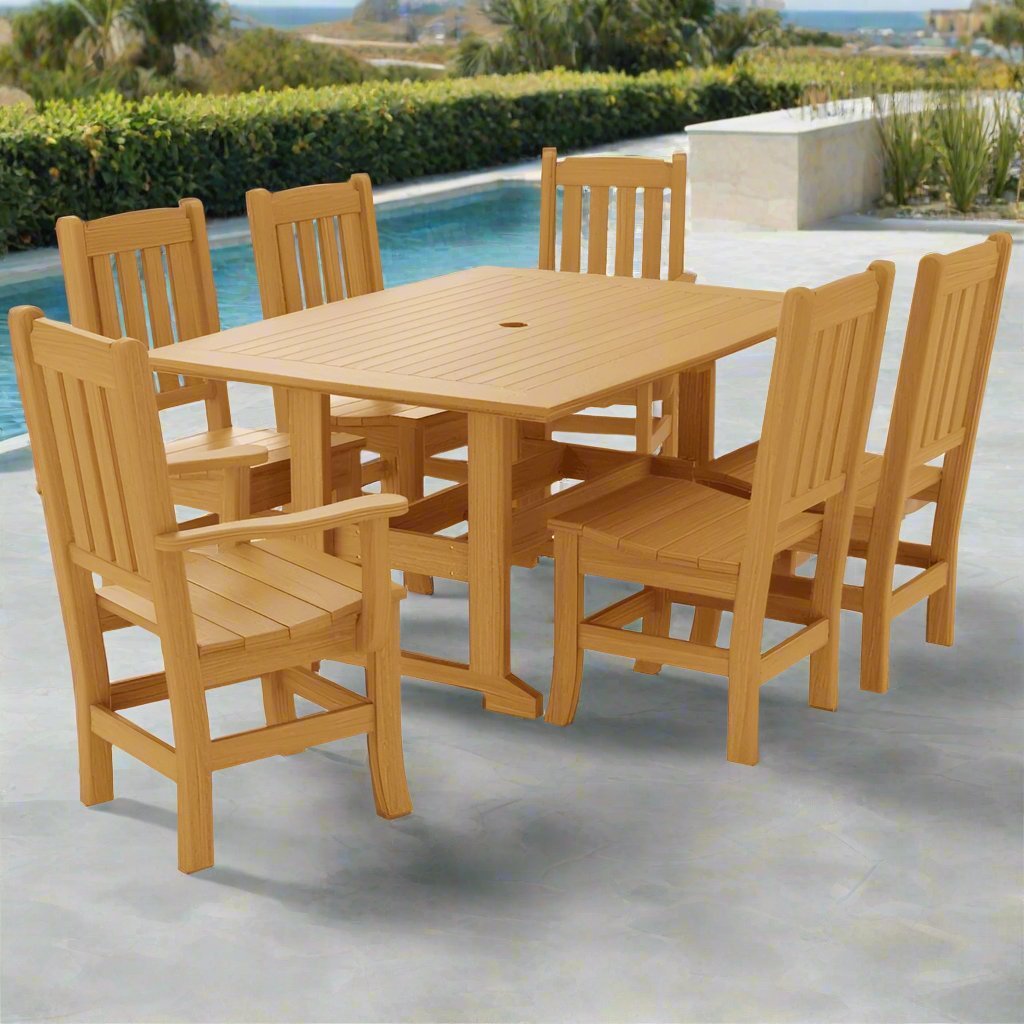 Natural teak poly dining set with a 60 inch table, umbrella hole and six mission slat back chairs by a pool