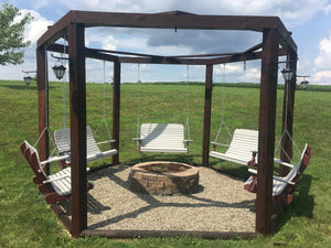 Five white and cherry poly porch swings hung from a hexagonal wooden pergola around a stone fire pit