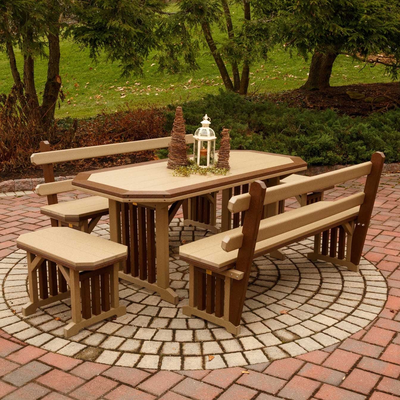 Cedar poly patio dining table with a bordered clipped-corner top and brown slatted mission trestle base on a white background