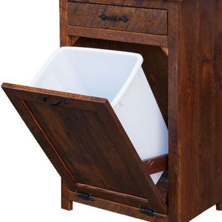 Tilt out trash bin cabinet shown open with the white waste container inside the reclaimed wood door