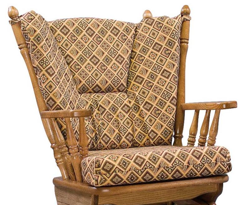 Oak glider rocker with low back cushions in a tan and green diamond medallion tapestry fabric