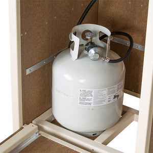 Interior view of a poly fire pit table base showing the propane tank strapped in place with hose and regulator