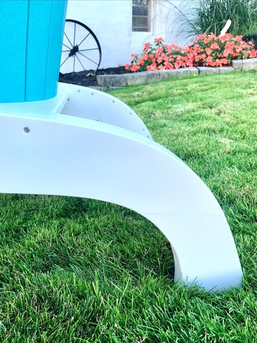 Close-up of the sculpted white curved base and stainless fasteners on a turquoise poly Adirondack perch chair