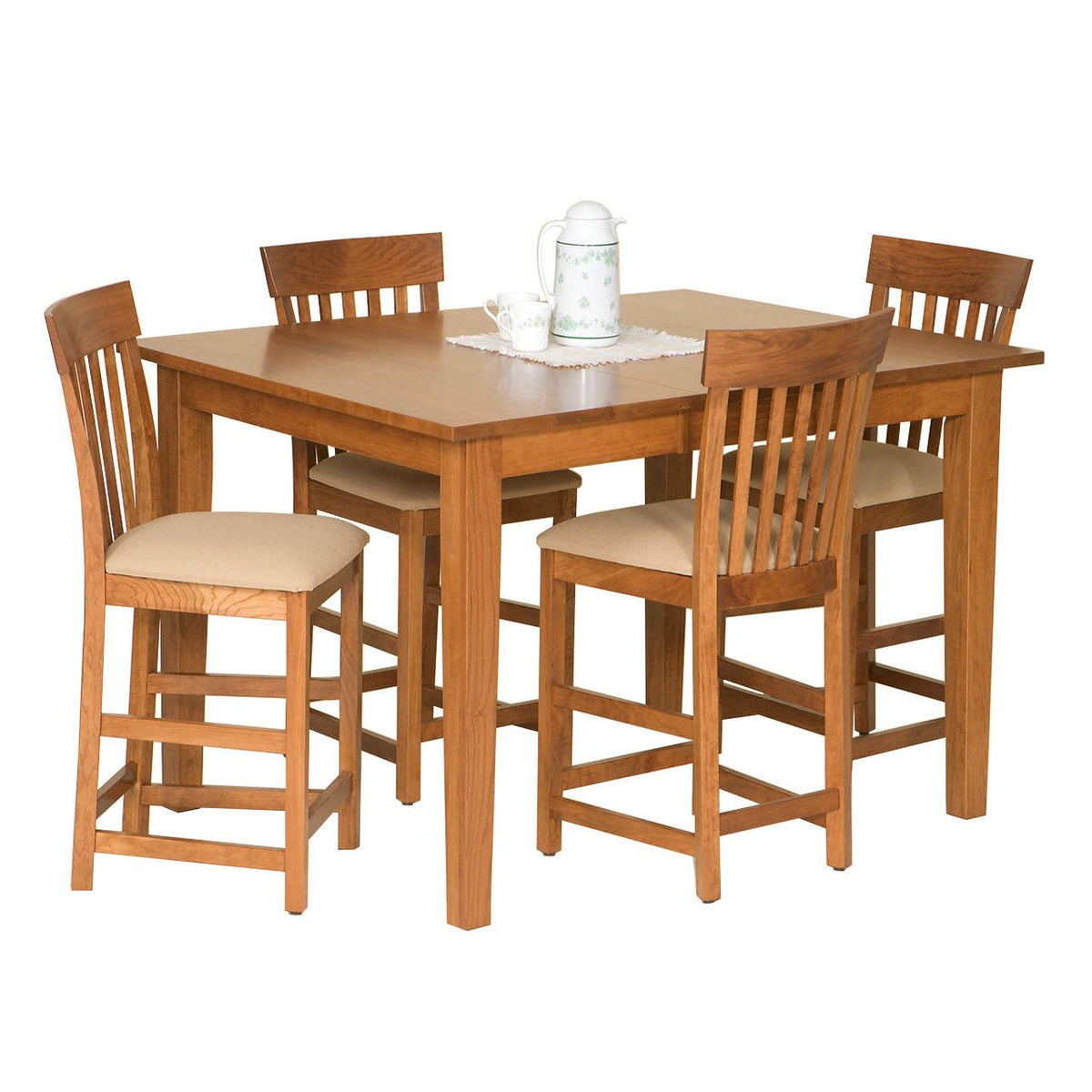 Light cherry counter height gathering table set with four slat back bar chairs with tan cushioned seats and a coffee server on top